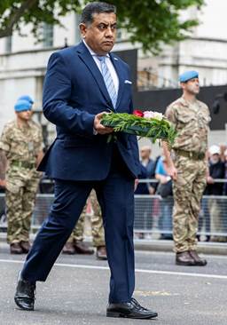 Lord Ahmad, Minister for the United Nations, lays the wreath on behalf of the government